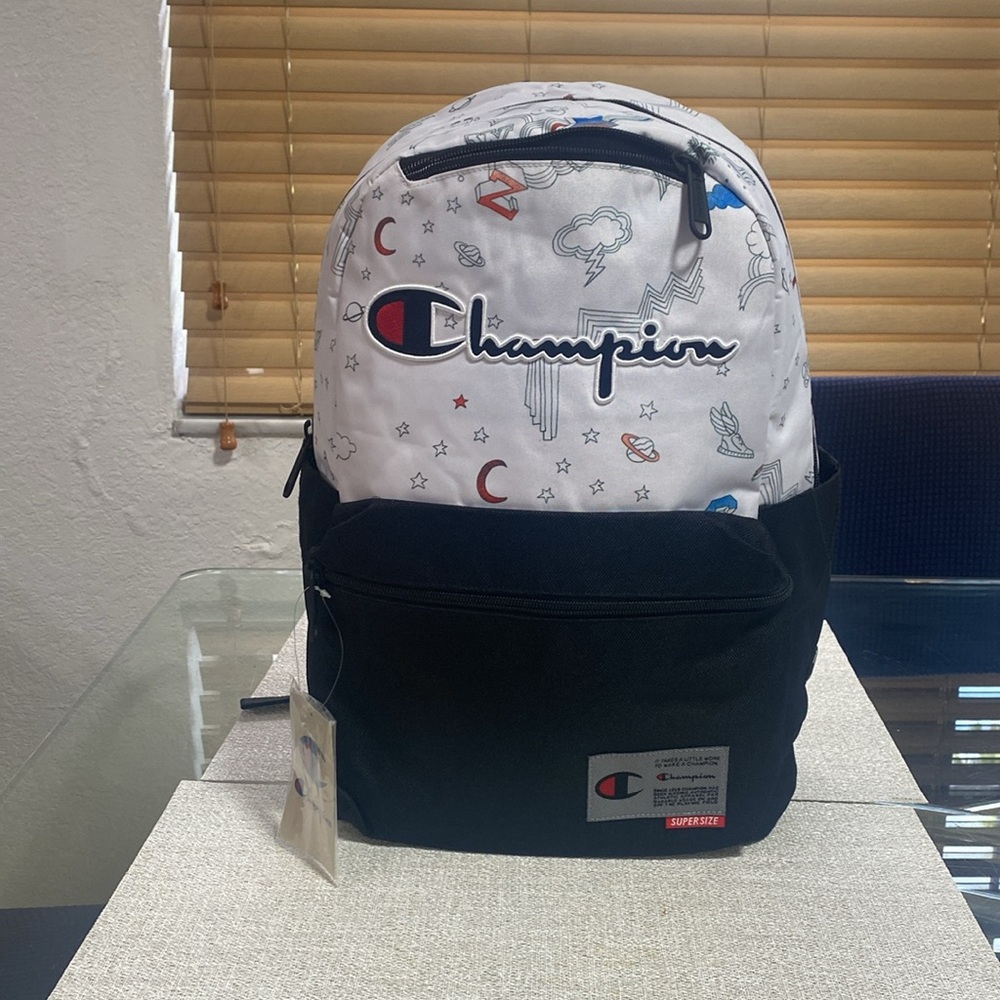 **CHAMPION*Back pack, with 15” LAPTOP SLEEVE, Front zip pocket.
